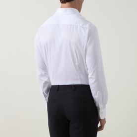 Model wearing Gherardi white single cuff regular formal shirt, rear view, styled with navy trousers.