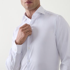 Model wearing Gherardi white single cuff regular formal shirt, close-up showing collar and button placket detail.