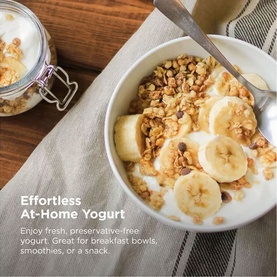Ninja Hyper Heat 9 in 1 Pressure and Rice Cooker lifestyle shot showing a granola and banana yogurt breakfast bowl on a wooden surface.