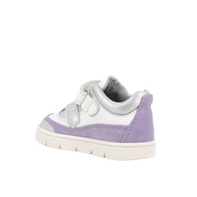 Primigi children's trainer in white with lilac suede panels, velcro strap fastening, and cream rubber sole, rear three-quarter view