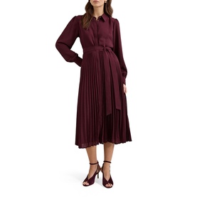 Model wearing Phase Eight red pleated midi shirt dress with tie belt and long sleeves, styled with heeled sandals