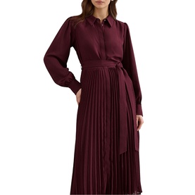 Model wearing Phase Eight red midi shirt dress with pleated skirt, tie waist belt, and long sleeves