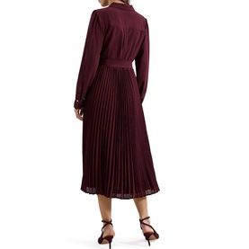 Model wearing Phase Eight red long-sleeve midi dress with pleated skirt, shown from behind, styled with strappy heels.