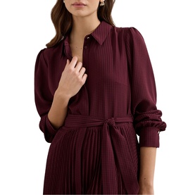 Model wearing Phase Eight red ribbed shirt dress with collar, puff sleeves, and tie waist belt, styled close-up view