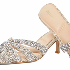 Nude kitten heel mule with all-over crystal embellishment, strappy pointed-toe upper, and slim heel