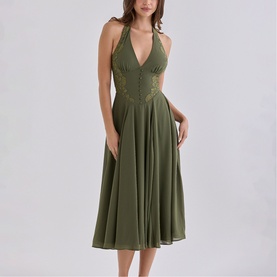 Model wearing House of CB olive halterneck midi dress with deep V-neckline, lace bodice detail and full A-line skirt