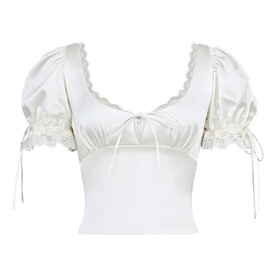 House of CB ivory satin crop top with puff sleeves, lace trim, and ribbon tie bust detail