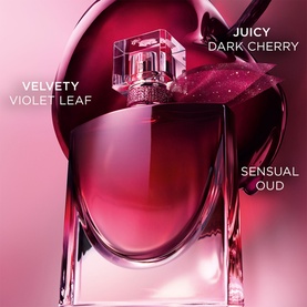 Lanc&ocirc;me EDP fragrance bottle in deep ruby red with faceted cap, annotated with notes: juicy dark cherry, velvety violet leaf, sensual oud