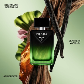 Prada Parfum in dark green bottle with black cap, surrounded by vanilla pods, geranium and wood, with Gourmand Geranium and Leathery Vanilla notes