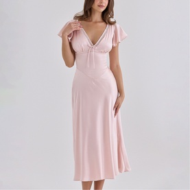 Model wearing House of CB pink midi dress with V-neckline, flutter sleeves, and ruched bust detail in a fluid silhouette.