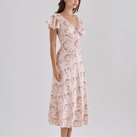 Model wearing House of CB Vintage Rose Floral midi dress with flutter sleeves, deep V-neck, and flared skirt silhouette.