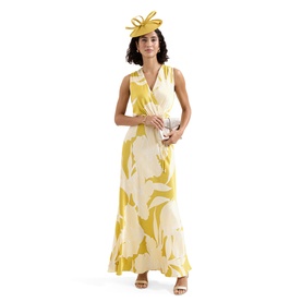 Model wearing Phase Eight yellow floral maxi dress with V-neckline, styled with matching yellow fascinator and cream clutch bag.