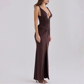 Model wearing House of CB Black Cherry maxi dress with deep V-neck, ruched waist detail and thigh-high split