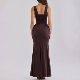 Model wearing House of CB Black Cherry maxi dress, back view, square neckline, fitted bodice with ruched detail, mermaid hem