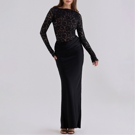 Model wearing House of CB black lace long-sleeve maxi dress with ruched jersey skirt and open back detail