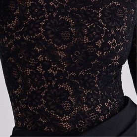 House of CB black floral lace bodycon dress, close-up detail showing sheer lace overlay with fitted silhouette and belt waist