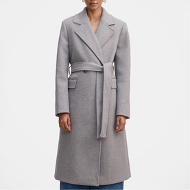 Model wearing Forever New Grey Marle belted wrap coat with notch lapels and patch pockets, styled with blue jeans.