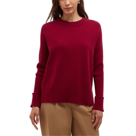 Model wearing Hobbs Calla Pink crew neck knit sweater with long sleeves, styled with tan trousers