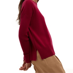 Model wearing Hobbs calla pink relaxed-fit ribbed knit jumper with drop shoulders and side slits, styled with camel trousers