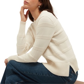 Model wearing Hobbs warm ivory ribbed-stripe knit jumper with crew neck and side splits, styled with blue jeans
