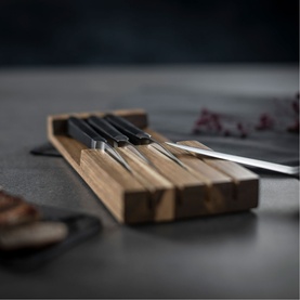 Kuhn Culinary Forged Four-Piece Steak Knife Set With Tray, black-handled steak knives displayed in an acacia wood storage tray on a grey surface