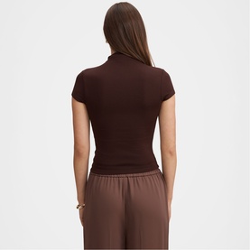 Model wearing Forever New chocolate ribbed short-sleeve high-neck top, styled with brown wide-leg trousers. Rear view.