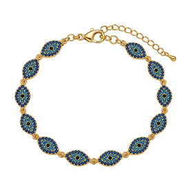 Lynott Jewellery gold-tone bracelet with blue evil eye motif links and lobster clasp extender chain