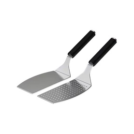 Set of two stainless steel spatulas with perforated and solid heads, black handles, on white background