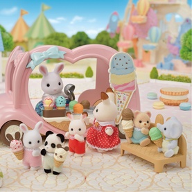 Sylvanian Families ice cream van playset with multiple flocked animal figures, cones, and pastel accessories in a fairground setting