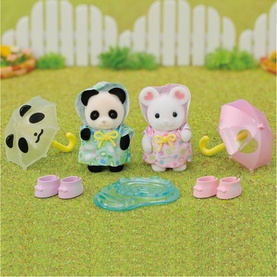 Sylvanian Families panda and mouse baby figures in pastel outfits with mini umbrellas, shoes, and accessories, multicoloured set