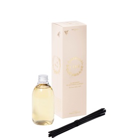 Trudon diffuser refill with clear liquid bottle, black reed sticks, and cream branded box with gold emblem detail