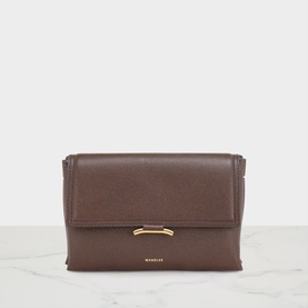 Wandler dark brown textured leather crossbody bag with gold-tone hardware clasp, structured silhouette, flap-over closure
