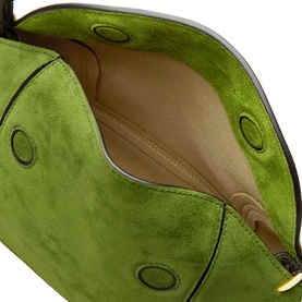 Wandler Verde Suede shoulder bag interior, showing green suede lining, gold zip detail, and circular eyelet embellishments
