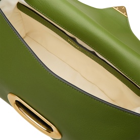 Wandler verde green calfskin shoulder bag, open top view showing cream cotton lining and gold oval hardware detail