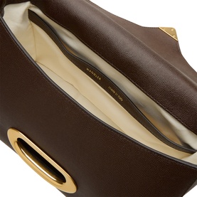 Wandler shoulder bag in Soil Caviar grained calf leather, open view showing cream cotton lining and gold-tone hardware detail