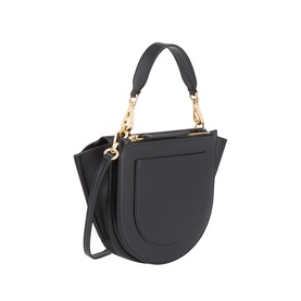 Wandler black calf leather top handle bag with gold-tone chain detail and removable crossbody strap, structured saddle shape