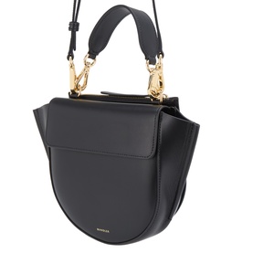 Wandler black calf leather top handle bag with gold-tone clasp hardware and adjustable crossbody strap, saddle silhouette