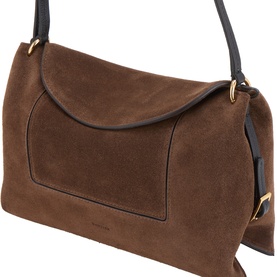 Brown suede shoulder bag with black leather trim, fold-over flap, and gold-tone hardware, shown at an angle