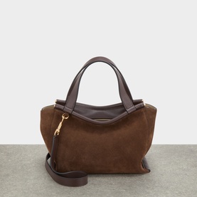 Wandler Palissander Suede top handle bag, brown suede body with dark leather handles, gold-tone clasp, and removable crossbody strap