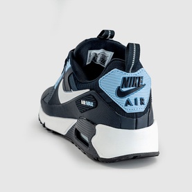 Nike Air Max 90 trainer in navy and light blue colourway, white midsole, rear three-quarter view showing Air unit and heel tab