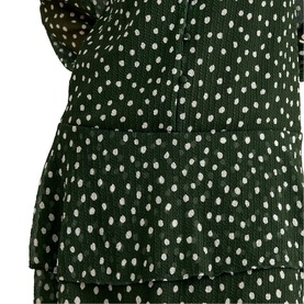 Phase Eight green and white polka dot dress, close-up detail showing tiered peplum layer and patch pocket