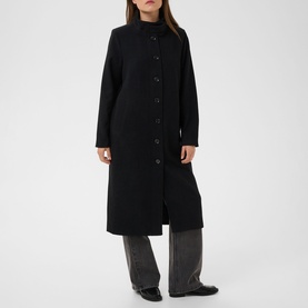 Model wearing Kaffe black deep longline button-front coat with stand collar, styled with wide-leg grey trousers.