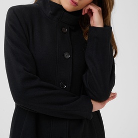 Model wearing Kaffe Black Deep coat with funnel neck collar and button-front fastening, close-up detail shot