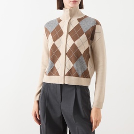 Model wearing Max Mara Studio Ecru wool cashmere argyle cardigan with high neck, styled with dark grey wide-leg trousers.