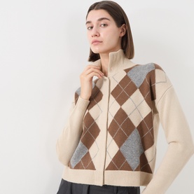 Model wearing Max Mara Studio Ecru wool-cashmere argyle cardigan with zip front and funnel neck, brown and grey diamond pattern.