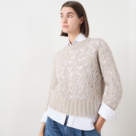 Model wearing Max Mara Studio Ladino Open-Knit Sweater in Natural, crew neck, open-knit construction, styled with white shirt and jeans