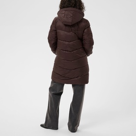 Model wearing Kaffe Coffee Bean quilted longline hooded puffer coat, styled with dark grey wide-leg trousers. Rear view.