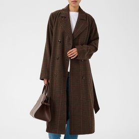 Model wearing Kaffe Fanni Checked Coat in Brown/Multi Check, longline double-breasted style with belt, styled with blue jeans and brown tote bag.