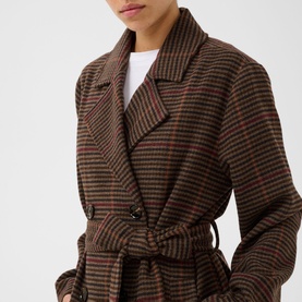 Model wearing Kaffe Fanni Checked Coat in Brown/Multi Check, double-breasted with cinched belt, styled with white crew-neck tee.