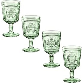 Set of four sage green embossed glass goblets with decorative medallion motif, beaded border detail, and footed base